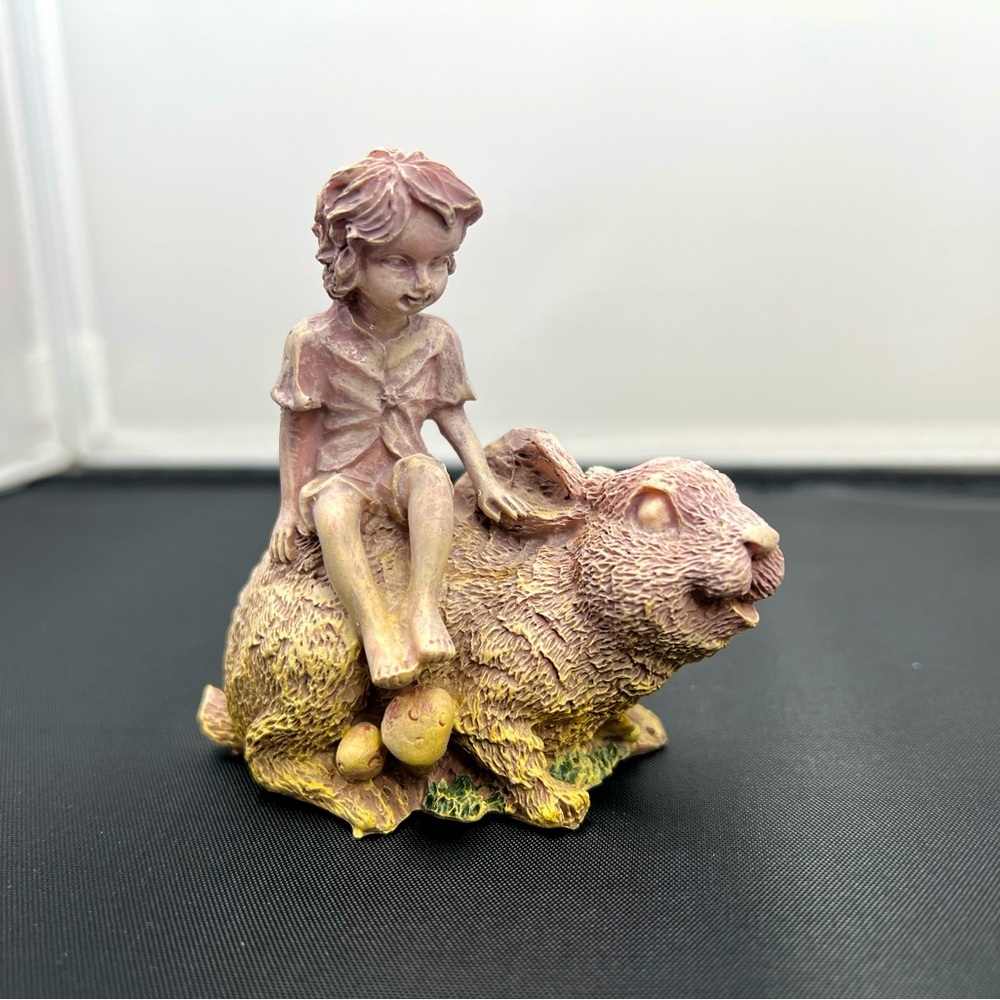 Vintage girl sitting on bunny rabbit Easter decoration ornament figurine‎